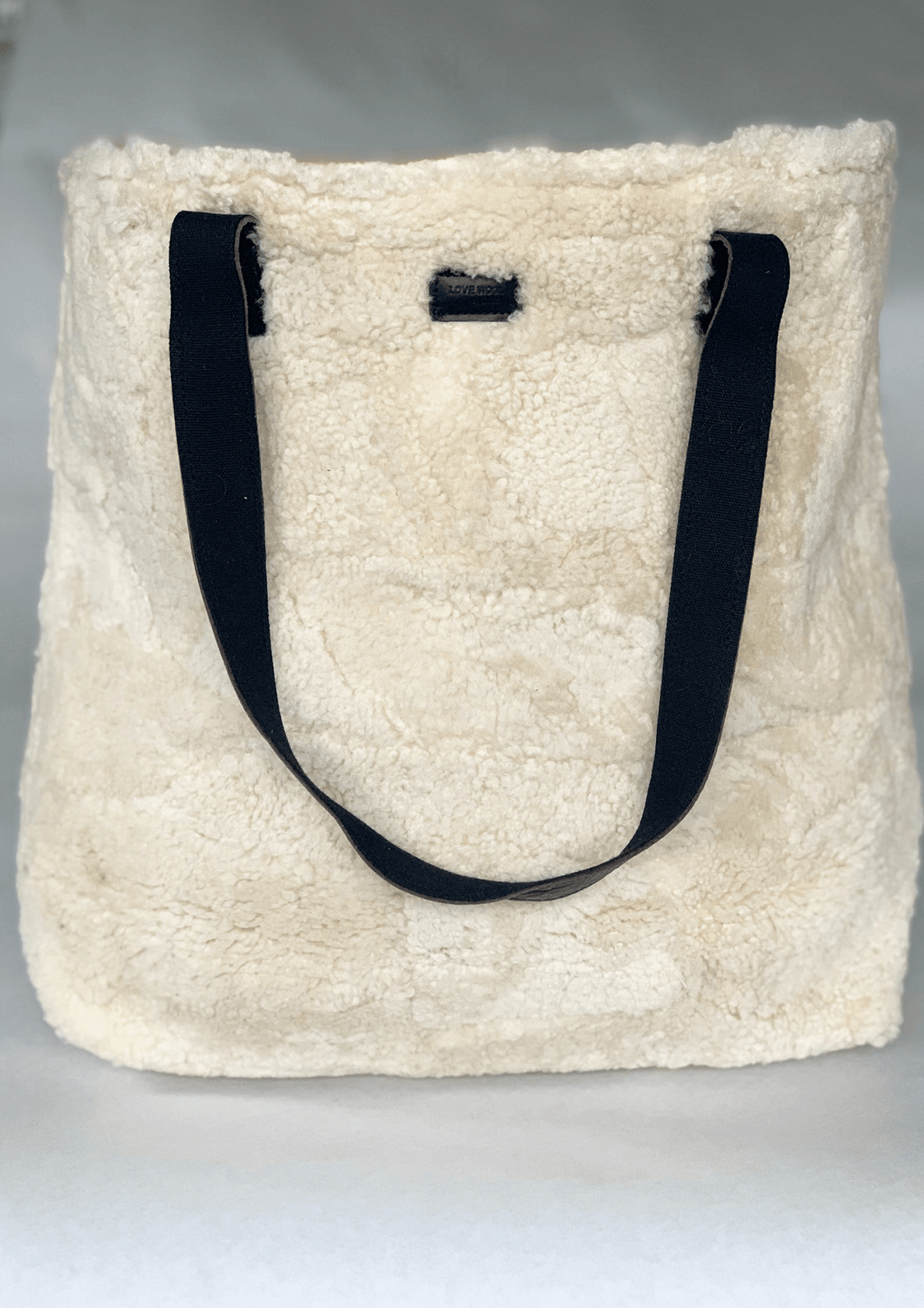 Lana nett/tote bag i lammeskinn – lys beige